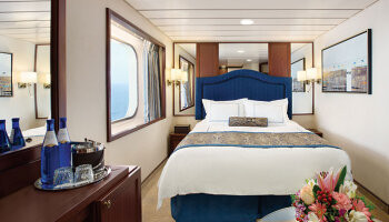 1548636829.6604_c370_Oceania Cruises Sirena Accommodation ocean-view-stateroom-e.jpg
